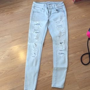 AEO Super Stretch Skinny Jeans Ripped Light Wash